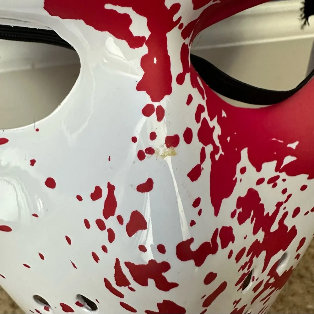 White Ice Rink Raider Mask With Blood Splatters Spirit Halloween